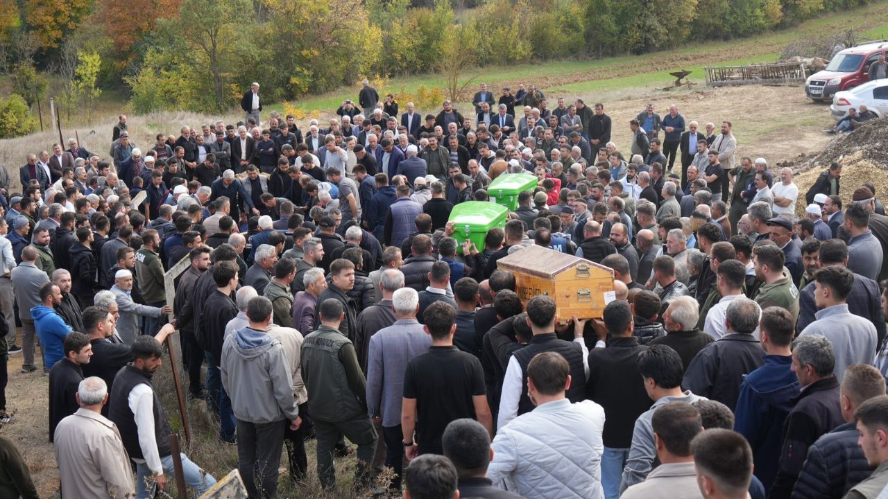 Yan yana toprağa verildiler